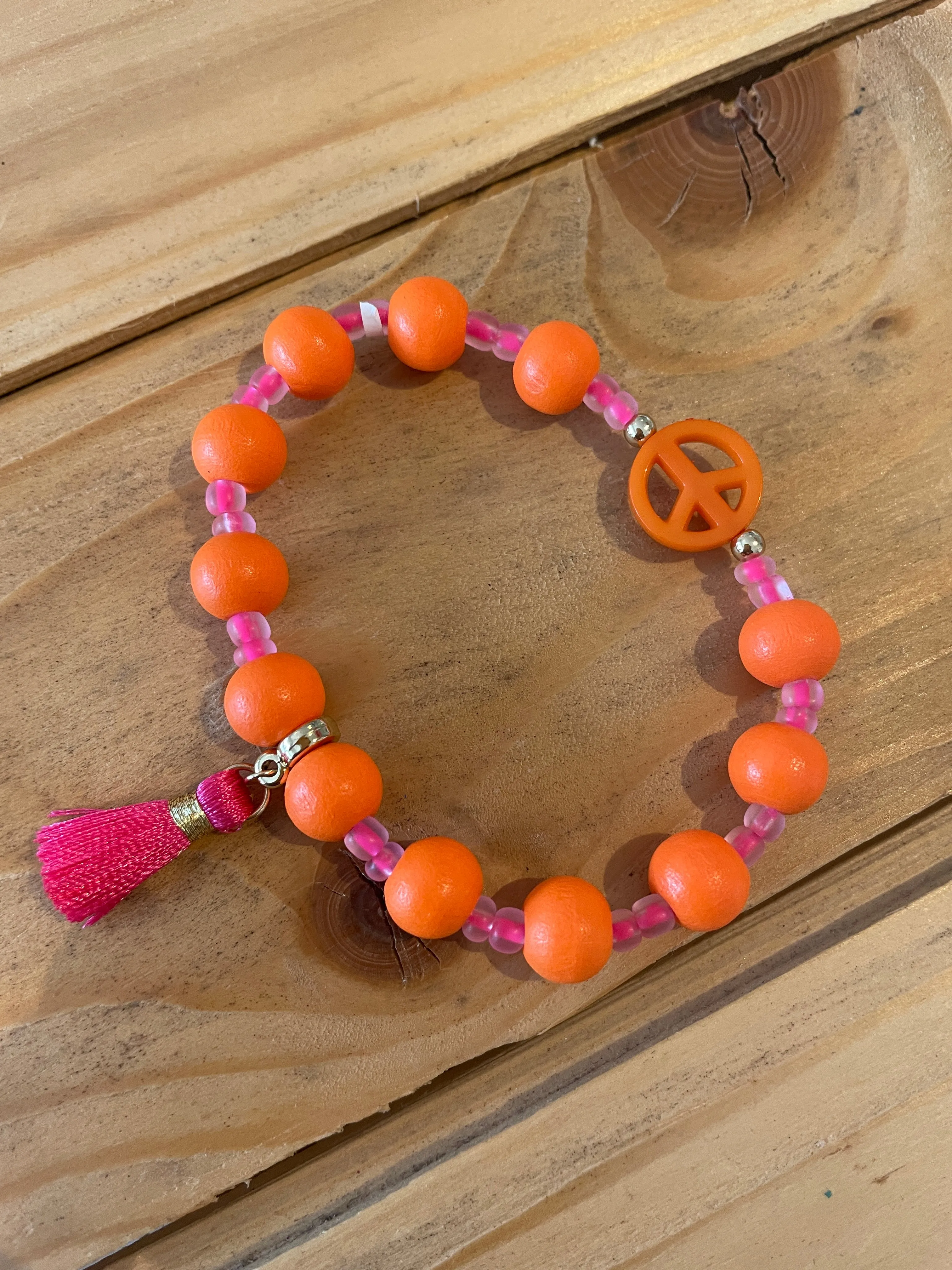 ARMBAND HOLZPERLEN ORANGE PINK TASSLE & PEACE