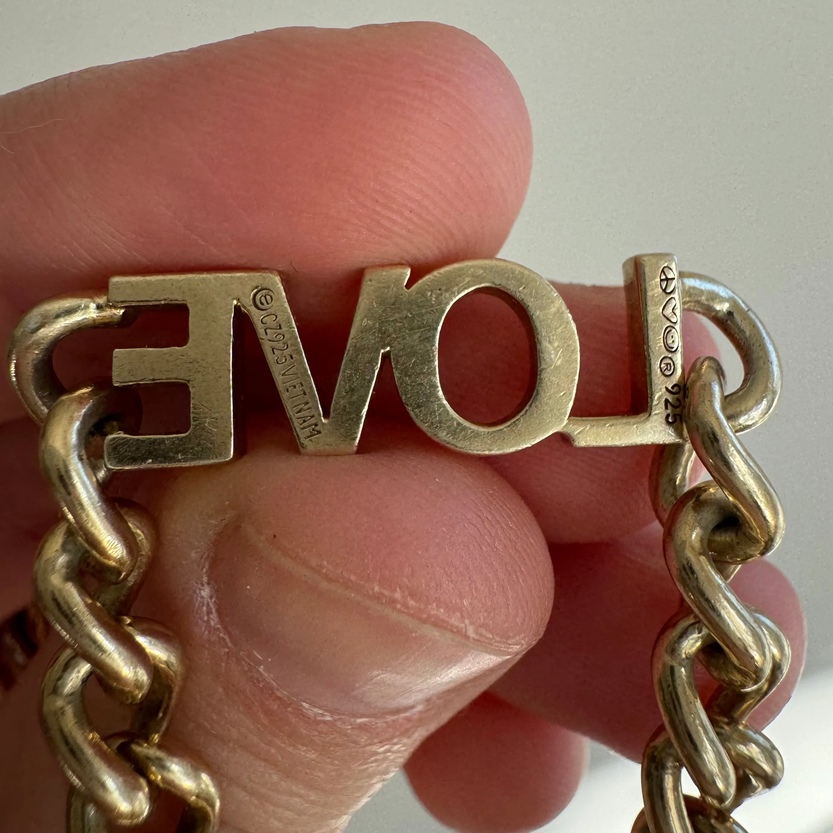 P R E - L O V E D // linked up LOVE / sterling silver and gold vermeil curb link LOVE bracelet / 7, 15g