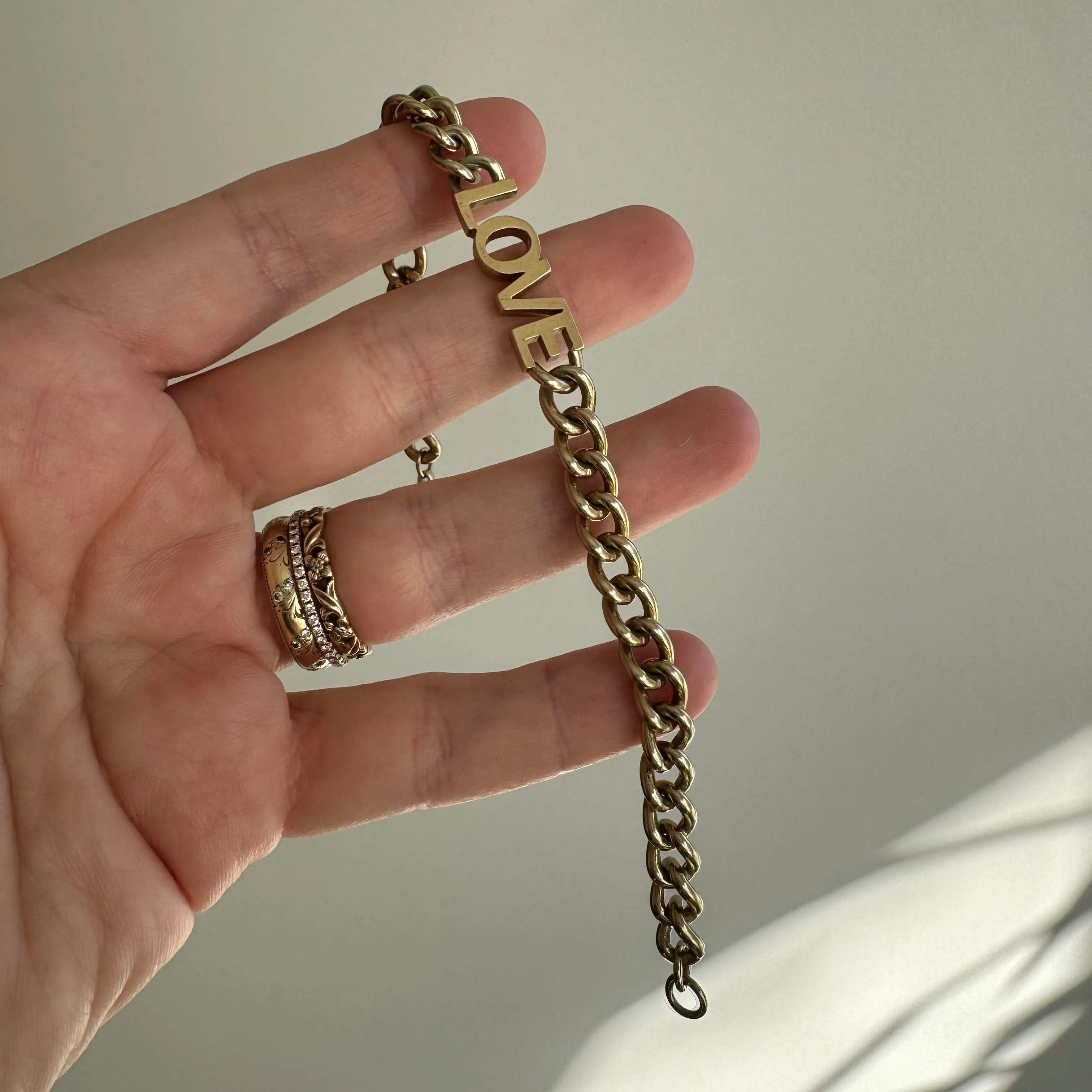 P R E - L O V E D // linked up LOVE / sterling silver and gold vermeil curb link LOVE bracelet / 7, 15g